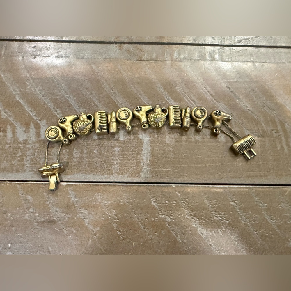 Vintage Hair and Makeup Gold Tone Charm Bracelet
